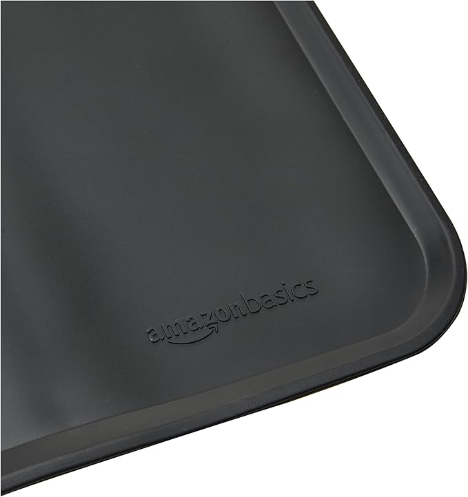 Amazon Basics Waterproof Anti-Slip Silicone Pet Food and Water Bowl Mat, 24 x 16 Inches, Black, Solid