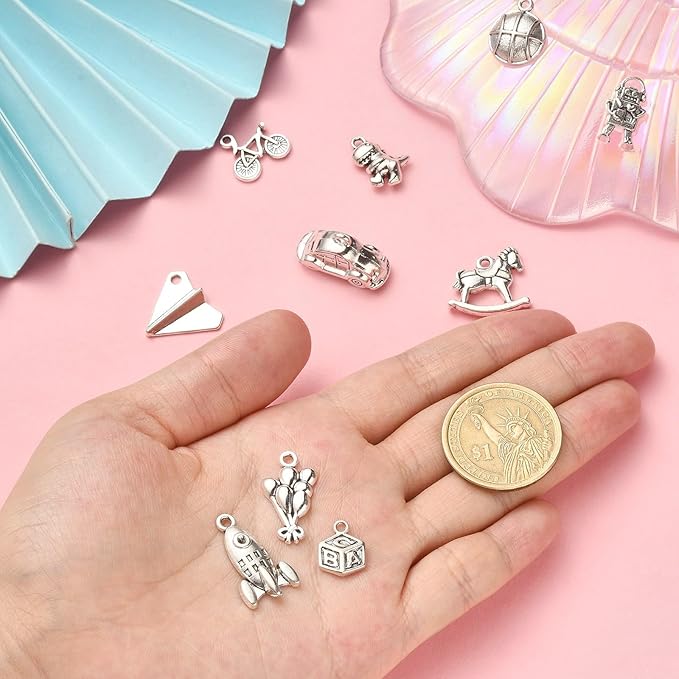 Stiesy 100 Pcs Toy Themed Tibetan Alloy Charms Car Balloon Dinosaur Robot Horse Basketball Charms for Men Women Bracelets Necklaces Jewelry Making