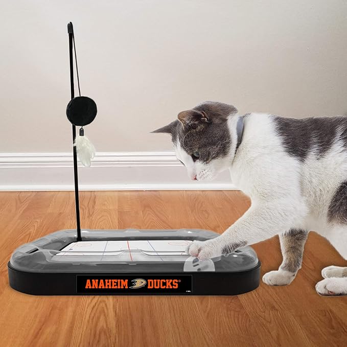 Pets First Cat Scratching Toy NHL Anaheim Ducks Hockey Field Cat Scratcher Toy with Interactive Cat Ball Bell in Tracks. 5-in-1 CAT Toy: Cat Wand Poll with Catnip Filled Plush Hockey Puck & Feathers.