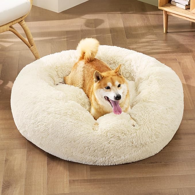 Bedsure Calming Dog Bed for Medium Dogs - Donut Washable Medium Pet Bed, Anti-Slip Round Fluffy Plush Faux Fur Cat Bed, Fits up to 45 lbs Pets, Oat Milk, 30 inches