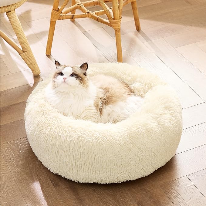 Bedsure Calming Cat Bed for Indoor Cats - Small Washable Round Cat Bed, Anti-Slip Fluffy Plush Faux Fur Pet Bed, Fits up to 15 lbs Pets, Oat Milk, 20 inches