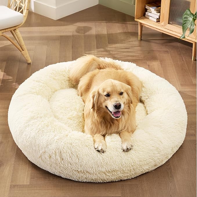 Bedsure Calming Dog Bed for Extra Large Dogs - Donut Washable Large Pet Bed, Anti-Slip Round Fluffy Plush Faux Fur Dog Bed, Fits up to 125 lbs Pets, Oat Milk, 45 inches